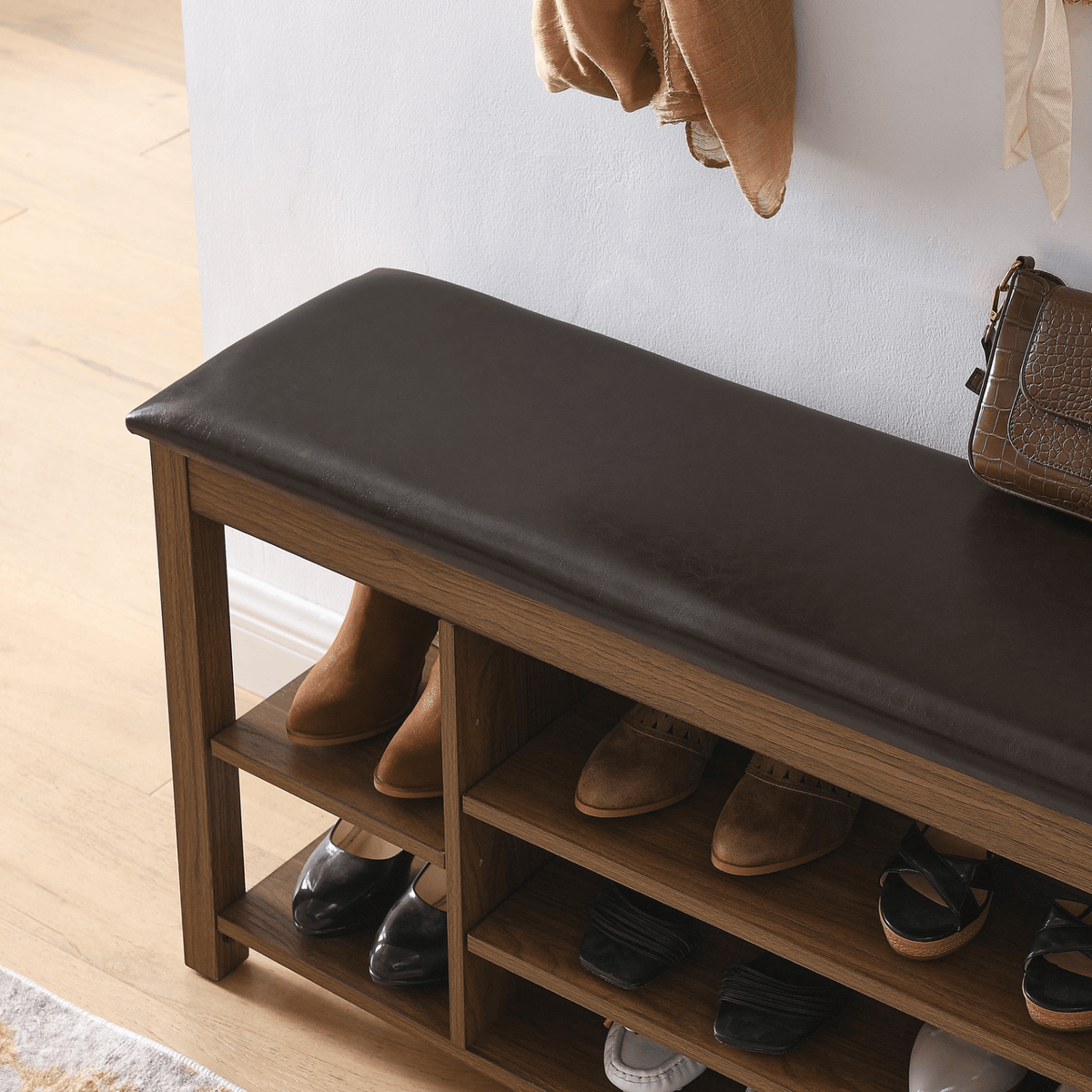 A height-adjustable long shoe-changing bench,made of natural rubberwood,comes with a comfortable seat,concealed storage space and large storage compartments. features natural wood grain.Brown - Mervyns
