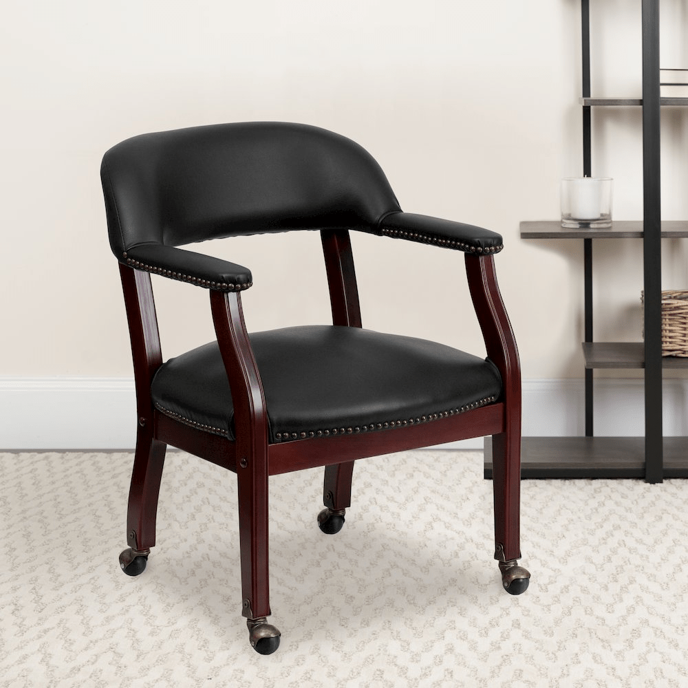 Black Vinyl Luxurious Conference Chair with Accent Nail Trim and Casters - Mervyns