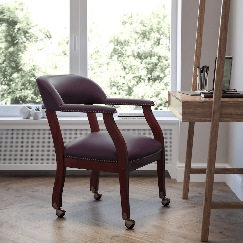 Burgundy LeatherSoft Conference Chair with Accent Nail Trim and Casters - Mervyns