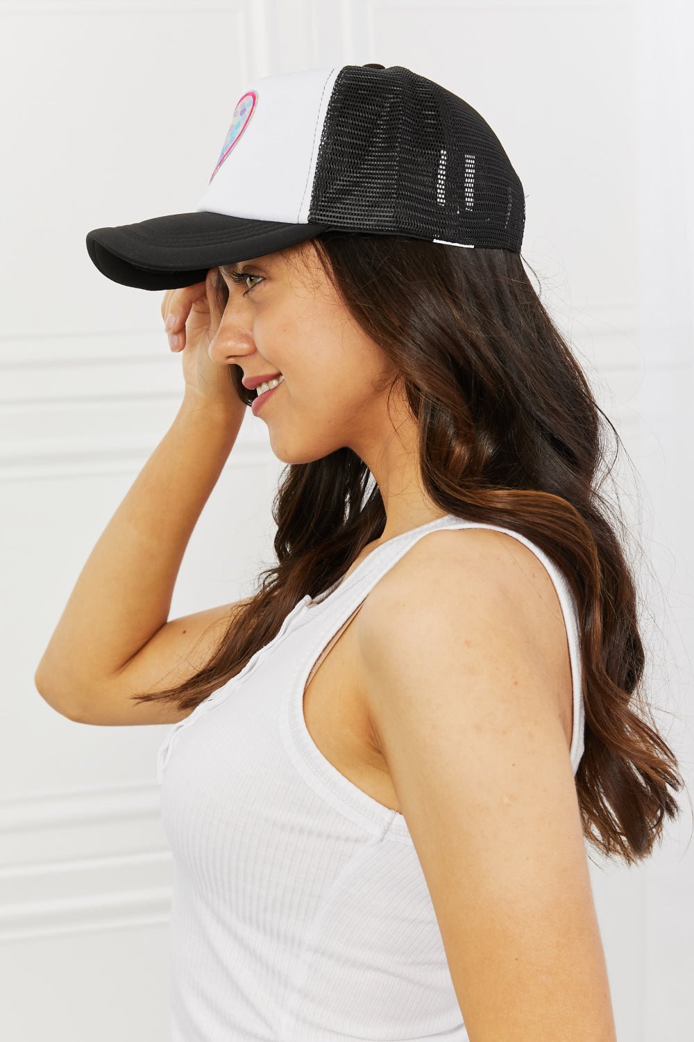 Fame Falling For You Trucker Hat in Black - Mervyns