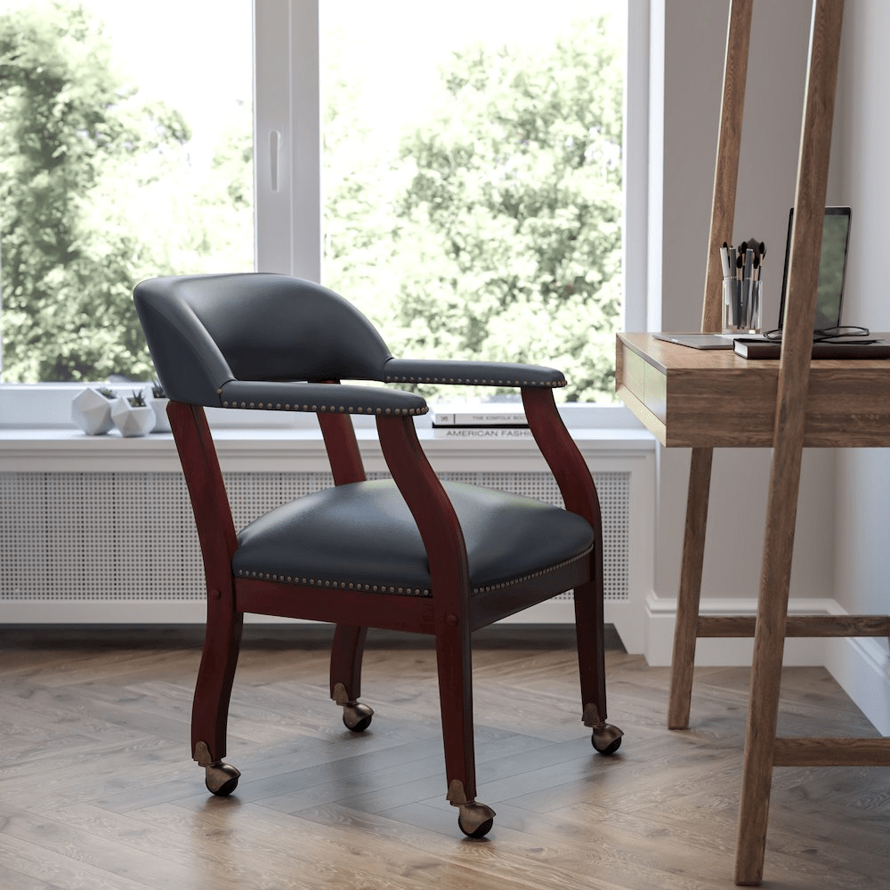 Navy Vinyl Luxurious Conference Chair with Accent Nail Trim and Casters - Mervyns