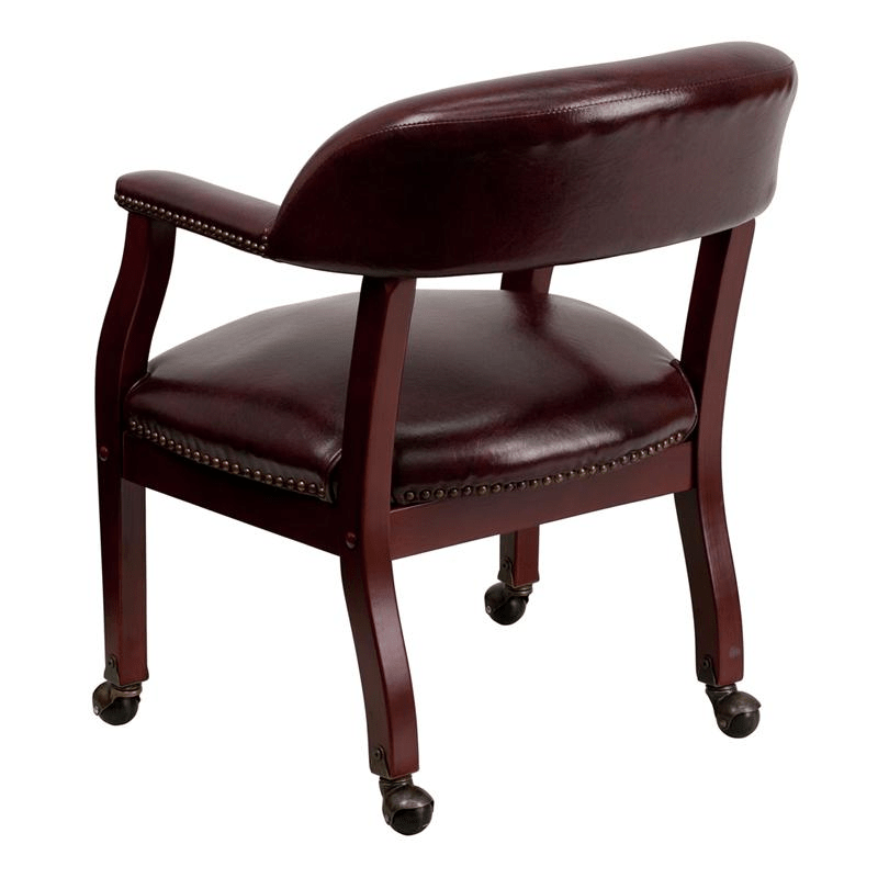Oxblood Vinyl Luxurious Conference Chair with Accent Nail Trim and Casters - Mervyns