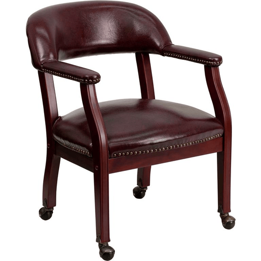 Oxblood Vinyl Luxurious Conference Chair with Accent Nail Trim and Casters - Mervyns
