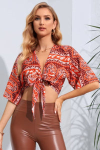 Thumbnail for Printed Tie Front Cropped Dolman Sleeve Blouse