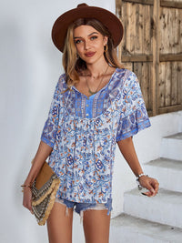 Thumbnail for Printed Tie Neck Half Sleeve Tunic Blouse