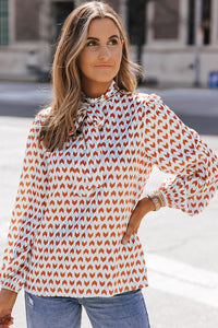 Thumbnail for Printed Tie Neck Long Sleeve Blouse